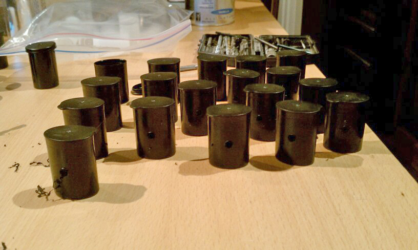 army of 35mm film cannister pinhole cameras